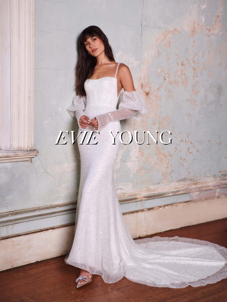 Model wearing a bridal gown by Evie Young